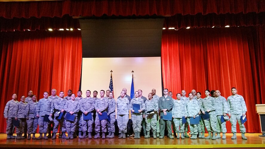 Friends, family and fellow Airmen honor  29 Community College of the Air Force graduates during the first 433rd Airlift Wing degree recognition ceremony at the Bob Hope Auditorium on Joint Base San Antonio-Lackland, Texas on February 27, 2016. The CCAF is the world’s largest degree granting institution of higher learning. (U.S. Air Force photo by Tech. Sgt. Carlos J. Trevino)