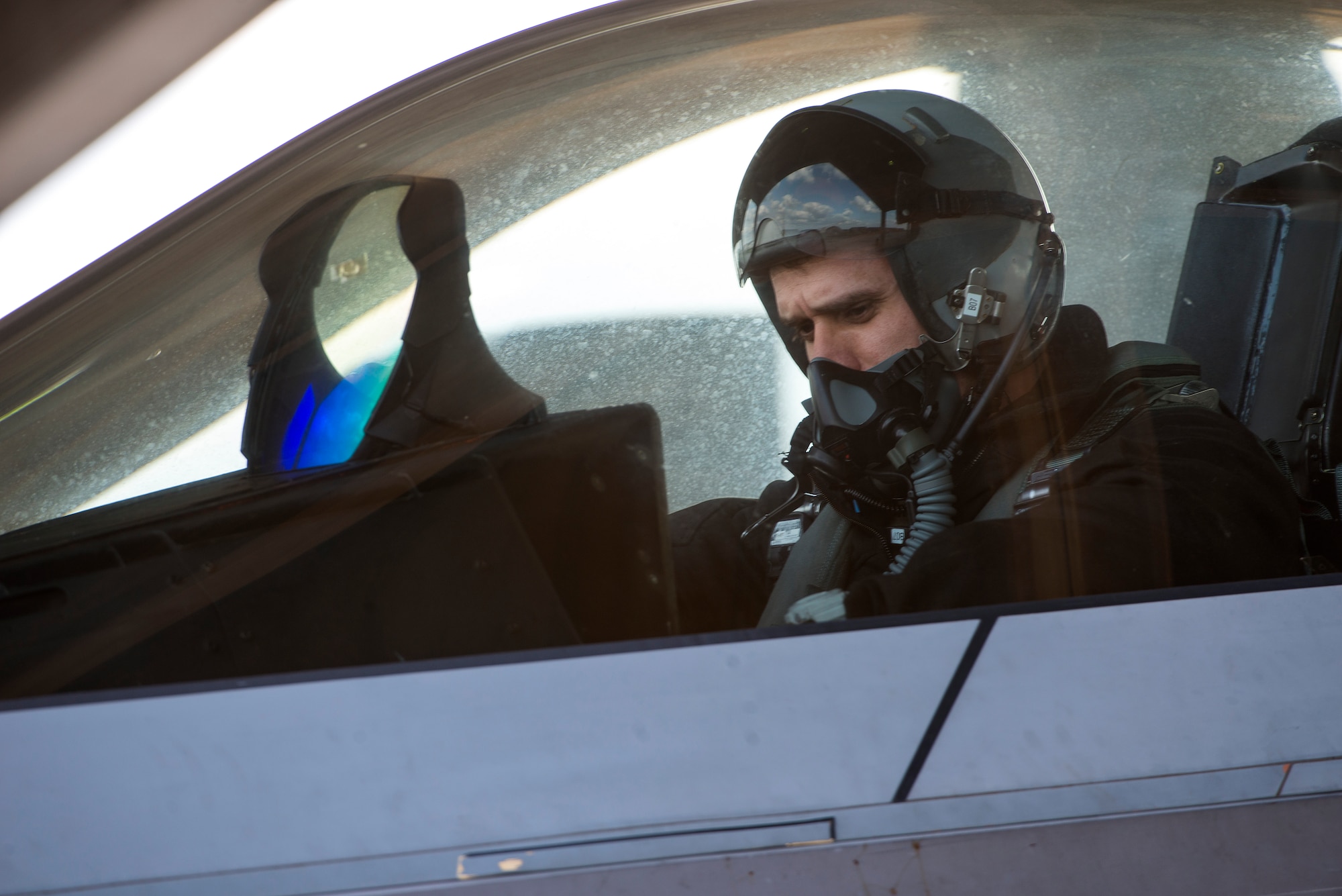 U.S. Air Force Lt. Col. Brandon Tellez, 525th Fighter Squadron commander and F-22 Raptor pilot, conducts pre-flight checks and prepares for takeoff Feb 17, 2016, at Kadena Air Base, Japan. The 525th FS from Joint Base Elmendorf-Richardson deployed several F-22s to Kadena in January for training exercises in the region. However, while here, the F-22s flew alongside other U.S. and Republic of Korea fighter aircraft over South Korea in response to recent North Korean provocation. (U.S. Air Force photo by Staff Sgt. Maeson L. Elleman)