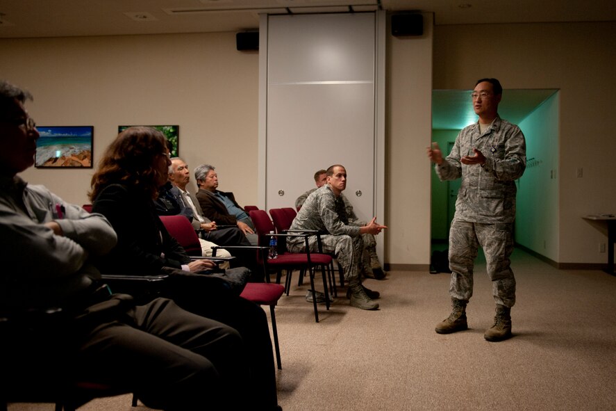 U.S. Air Force Maj. Paul Kim, 18th Aerospace Medical Squadron theater preventive medicine chief, speaks to an audience during an Okinawa Public Health Partners seminar in the 18th Medical Group Clinic Feb. 25, 2016, at Kadena Air Base, Japan.  Kim addressed various plans and programs with Japanese partners to enhance interoperability between military and civilian environmental health agencies in Okinawa. (U.S. Air Force photo by Senior Airman Peter Reft)