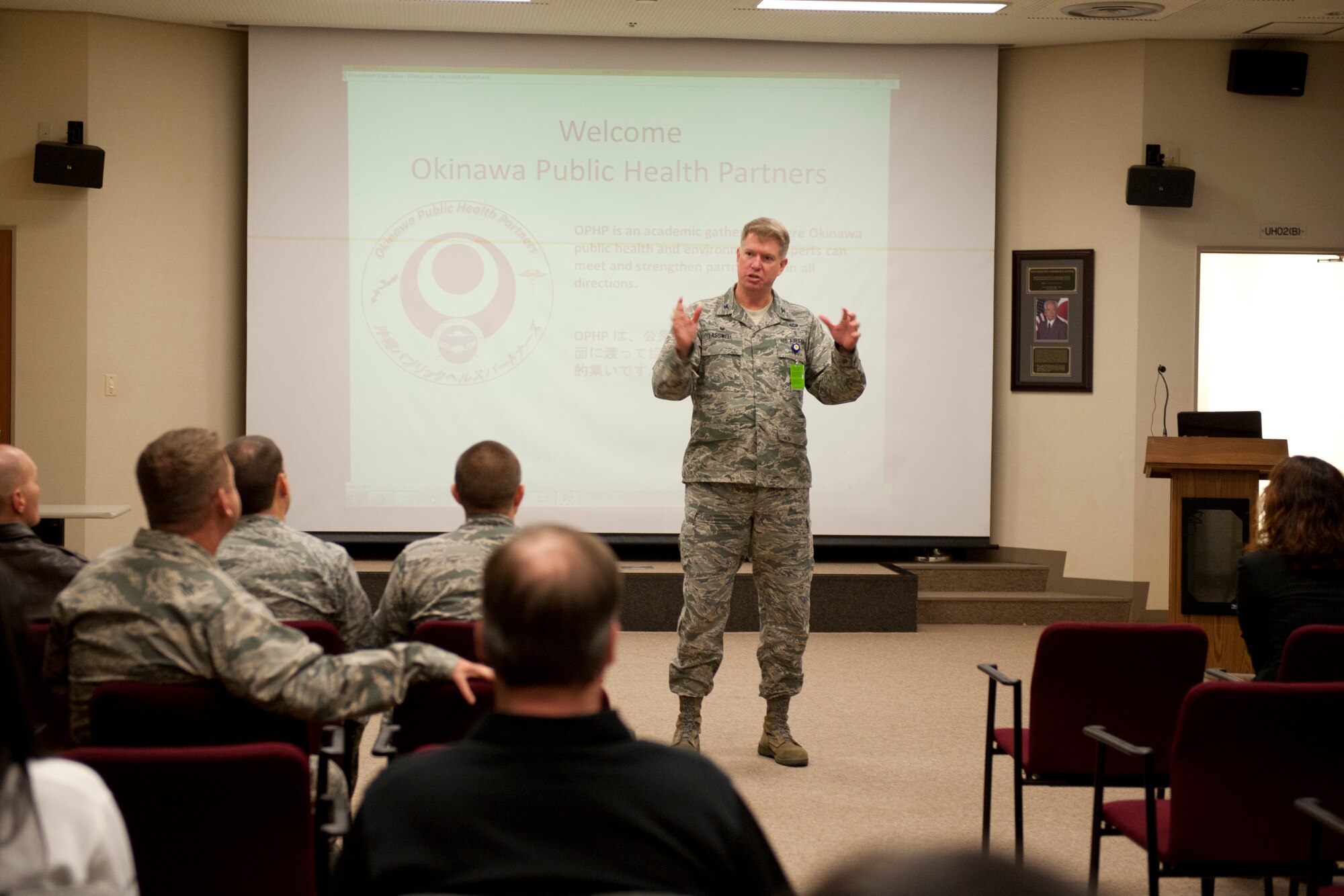 U.S. Air Force Col. James Lasswell, 18th Medical Group commander, welcomes U.S. and Japanese health partners to an Okinawa Public Health Partners seminar at the 18th MDG clinic Feb. 25, 2016, at Kadena Air Base, Japan. Lasswell emphasized the importance of U.S. and Japanese collaboration to better monitor and address public health issues in Okinawa. (U.S. Air Force photo by Senior Airman Peter Reft)