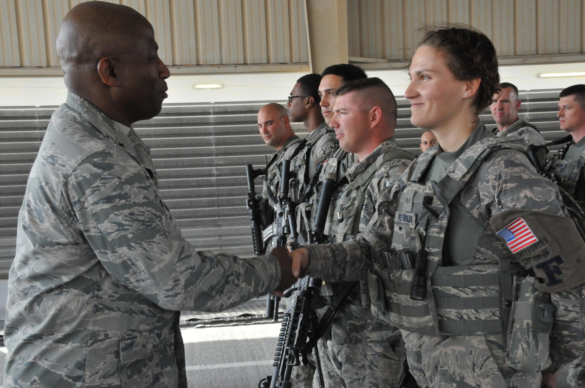 Brig. Gen. Allen Jamerson, director of Security Forces, visited the 379th Expeditionary Security Forces Squadron Feb. 24 at Al Udeid Air Base, Qatar. While visiting AUAB, Jamerson took a vehicle search area tour to show defenders his appreciation. During the visit he talked to defenders and answered career centered questions.  (U.S. Air Force Photo by Tech. Sgt. Terrica Y. Jones)
