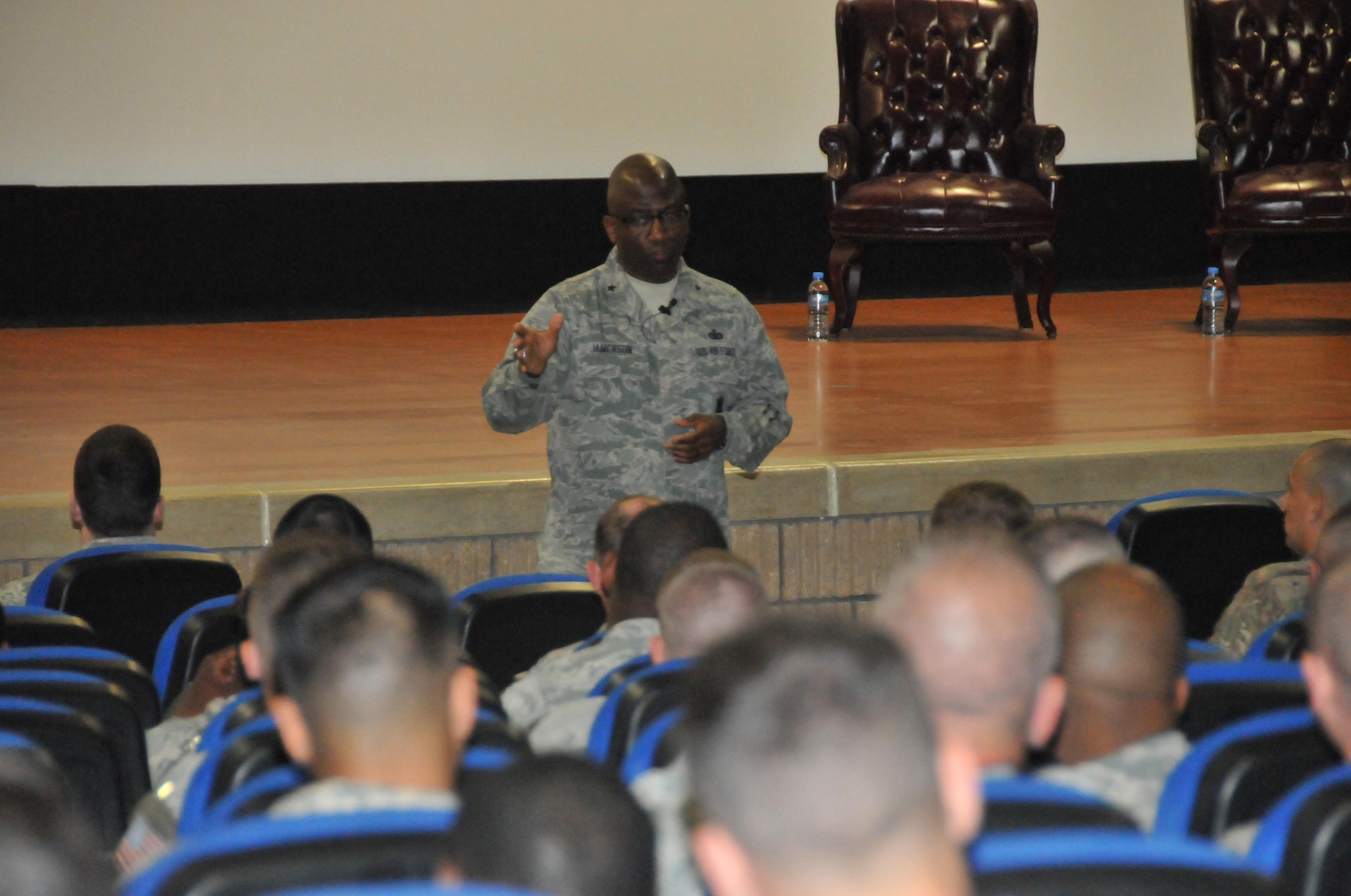 Brig. Gen. Allen Jamerson, director of Security Forces, holds a director’s call for more than 100 members of the 379th Expeditionary Security Forces Squadron Feb. 24 at Al Udeid Air Base, Qatar. During the director’s call Jamerson talks about Security Forces in general and how they can continue to support defenders. (U.S. Air Force Photo by Tech. Sgt. Terrica Y. Jones)