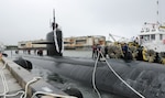 130809-N-LS794-048 APRA HARBOR, Guam (Sept. 20, 2013) – Sailors aboard the Los Angeles-class fast attack submarine USS Chicago (SSN 721) secures mooring lines as Chicago returns from an 11-week deployment in the 7th Fleet Area of Responsibility.  Chicago is one of three forward deployed submarines stationed in Guam.  (U.S. Navy photo by Mass Communication Specialist 1st Class Jeffrey Jay Price/Released)