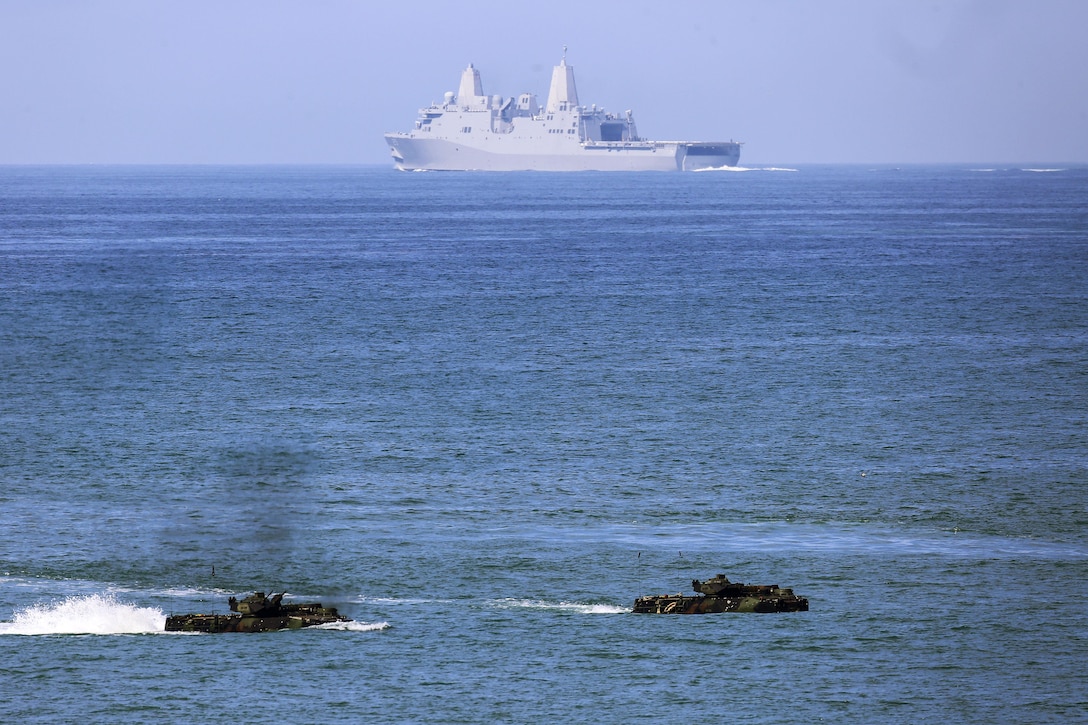 Marine amphibious assault craft move ashore during an Exercise Iron Fist 2016 landing exercise held off the shore of Marine Corps Base Camp Pendleton, Calif., Feb. 26, 2016. The Marines are assigned to 3rd Assault Amphibian Battalion, 1st Marine Division, 1st Marine Expeditionary Force. PHIBLEX is a ship-to-shore movement via AAVs from the USS Somerset onto the beaches of Marine Corps Base Camp Pendleton. Iron Fist is an annual, bilateral amphibious training exercise designed to improve U.S. Marines and Japanese forces ability to plan, communicate and conduct combined amphibious operations at the platoon, company and battalion levels. U.S. Marine Corps photo by Cpl. April L. Price      