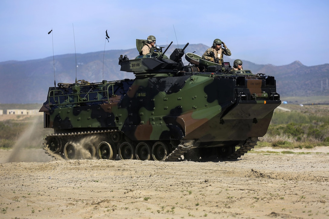 Marines position an amphibious assault landing vehicle for security during a landing exercise that's part of Exercise Iron Fist 2016 off the shore of Marine Corps Base Camp Pendleton, Calif., Feb. 26, 2016. U.S. Marine Corps photo by Cpl. April L. Price  