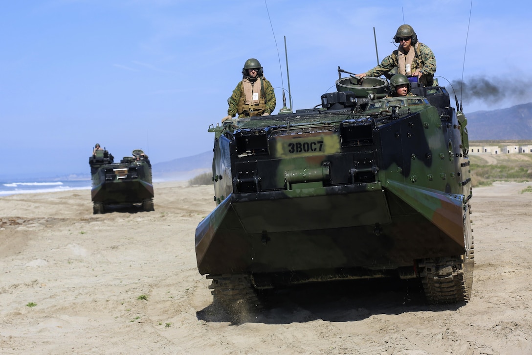 Marines move along the beach toward their next objective during an amphibious landing exercise that's part of Exercise Iron Fist 2016 off the shore of Marine Corps Base Camp Pendleton, Calif., Feb. 26, 2016. U.S. Marine Corps photo by Cpl. April L. Price