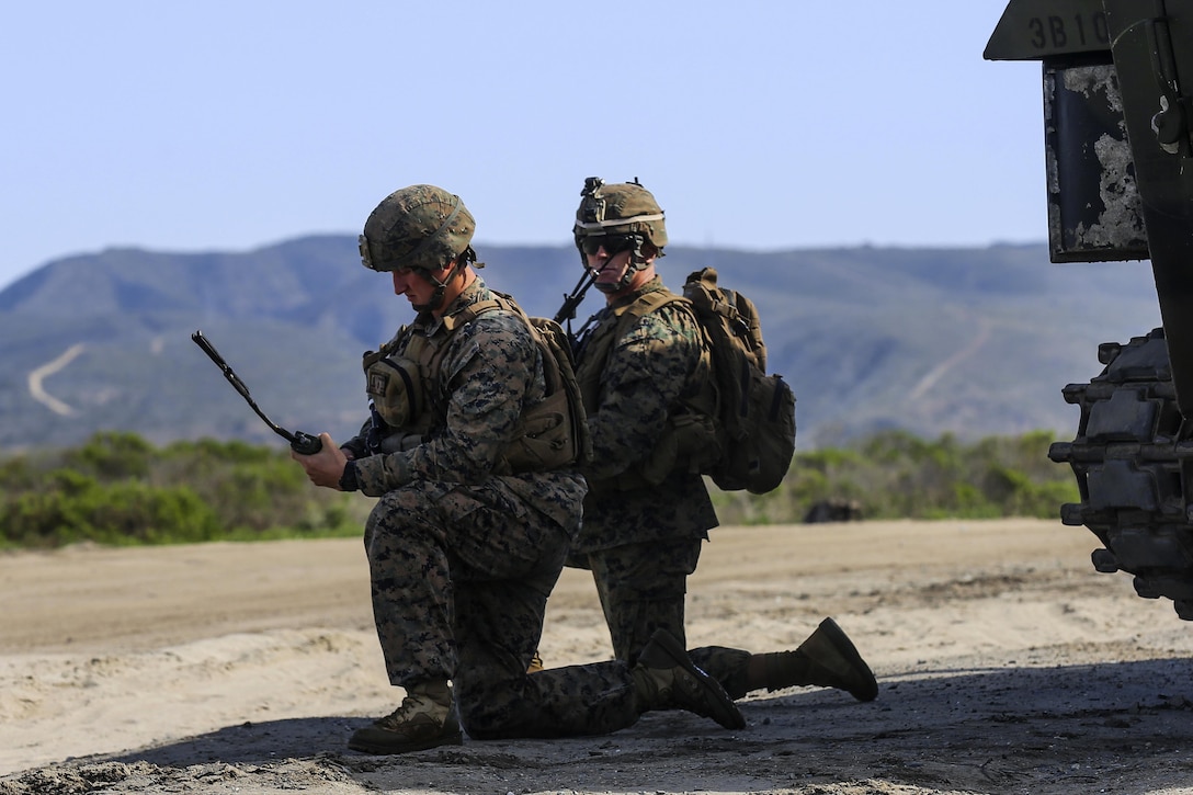 Marines check their radios during an amphibious landing exercise that's part of Exercise Iron Fist 2016 off the shore of Marine Corps Base Camp Pendleton, Calif., Feb. 26, 2016. U.S. Marine Corps photo by Cpl. April L. Price