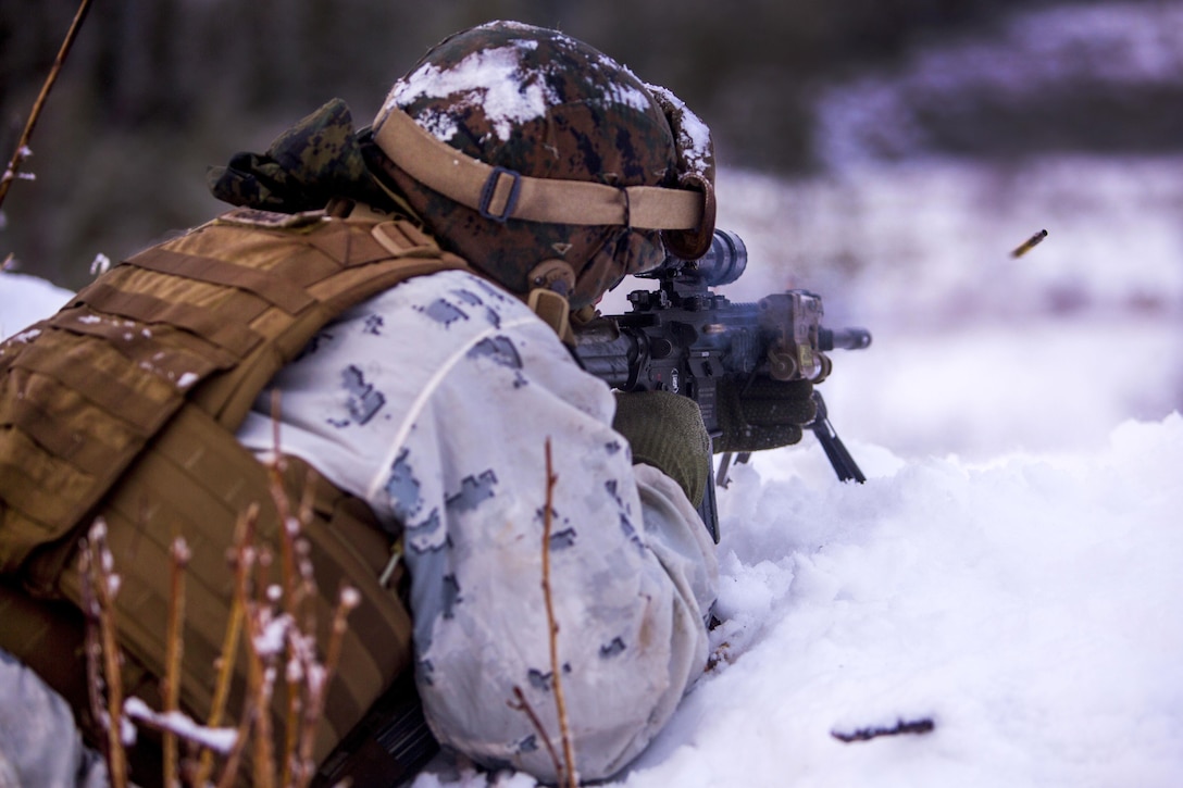Marine Corps Pfc. Anderson Gonzales fires his weapon while participating in a platoon assault drill as a part of Exercise Cold Response 16 on range U-3 in Frigard, Norway, Feb. 23, 2016. Gonzales is assigned to India Company, 3rd Battalion, 2nd Marine Regiment, 2nd Marine Division. U.S. Marine Corps photo by Cpl. Rebecca Floto
