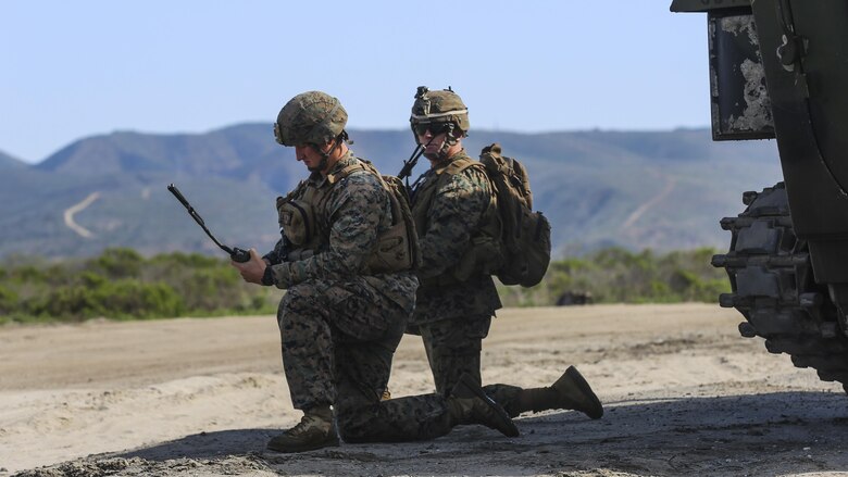Marines with 1st Battalion, 4th Marine Regiment and 3d Assault Amphibian Battalion,1st Marine Division, I Marine Expeditionary Force, check their communication connections during a scenario-based, battalion-sized amphibious landing exercise for Exercise Iron Fist 2016, Feb. 26, 2016. Iron Fist is an annual, bilateral amphibious training exercise designed to improve USMC and JGSDF’s ability to plan, communicate and conduct combined amphibious operations at the platoon, company and battalion levels.