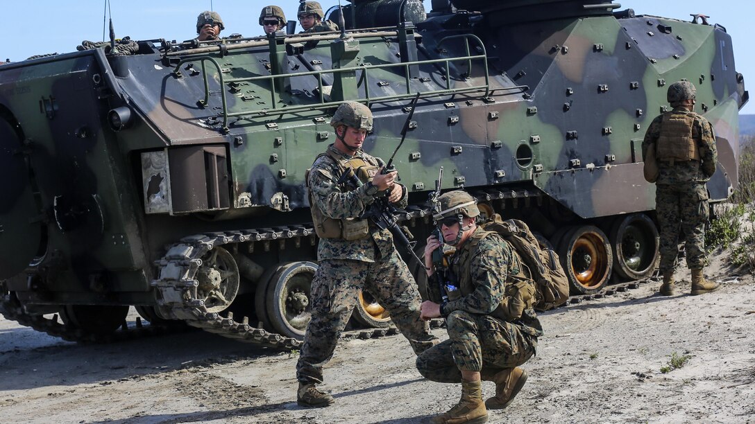 Marines with 1st Battalion, 4th Marine Regiment and 3d Assault Amphibian Battalion,1st Marine Division, I Marine Expeditionary Force, check their communication connections during a scenario-based, battalion-sized amphibious landing exercise for Exercise Iron Fist 2016, Feb. 26, 2016. Iron Fist is an annual, bilateral amphibious training exercise designed to improve USMC and JGSDF’s ability to plan, communicate and conduct combined amphibious operations at the platoon, company and battalion levels.