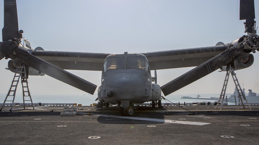 U.S. Marines with Marine Medium Tiltrotor Squadron 162 (Reinforced), 26th Marine Expeditionary Unit conduct maintenance on an MV-22B Osprey aboard the USS Kearsarge (LHD 3), Feb. 17, 2016. The 26th MEU is embarked on the Kearsarge Amphibious Ready Group and is deployed to maintain regional security in the U.S. 5th Fleet area of operations.