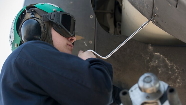 U.S. Marine Lance Cpl. Jeffrey J. Patrick, an MV-22 mechanic with Marine Medium Tiltrotor Squadron 162 (Reinforced), 26th Marine Expeditionary Unit, removes screws from the blade of an MV-22B Osprey during routine maintenance aboard the USS Kearsarge (LHD 3), Feb. 17, 2016. The 26th MEU is embarked on the Kearsarge Amphibious Ready Group and is deployed to maintain regional security in the U.S. 5th Fleet area of operations.