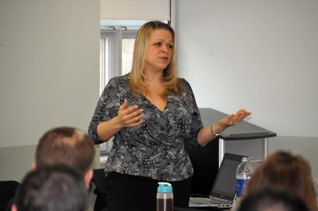 Christine Ploschke, acting chief, Environmental Division, and Environmental Compliance Branch and Energy Branch manager with the Army Reserve’s 99th Regional Support Command at Joint Base McGuire-Dix-Lakehurst, New Jersey, addresses the facility coordinator training class held Feb. 23 at Fort Indiantown Gap, Pennsylvania. The two-day class was designed to help coordinators improve their individual Army Reserve center.  The 99th is offering the training monthly throughout the 13-state region it oversees.