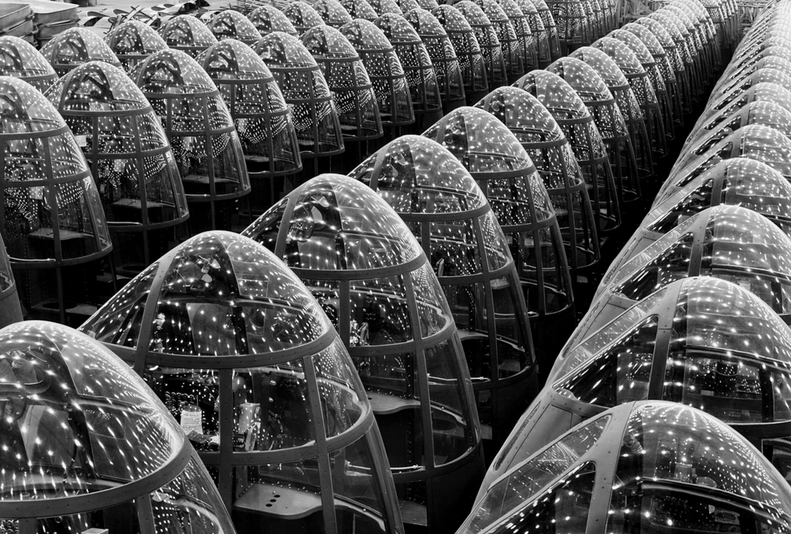 Myriads of lights at the Long Beach, Calif., plant of Douglas Aircraft Company form pleasing star patterns in the shatterproof plexiglass windows of noses for A-20 attack bombers.