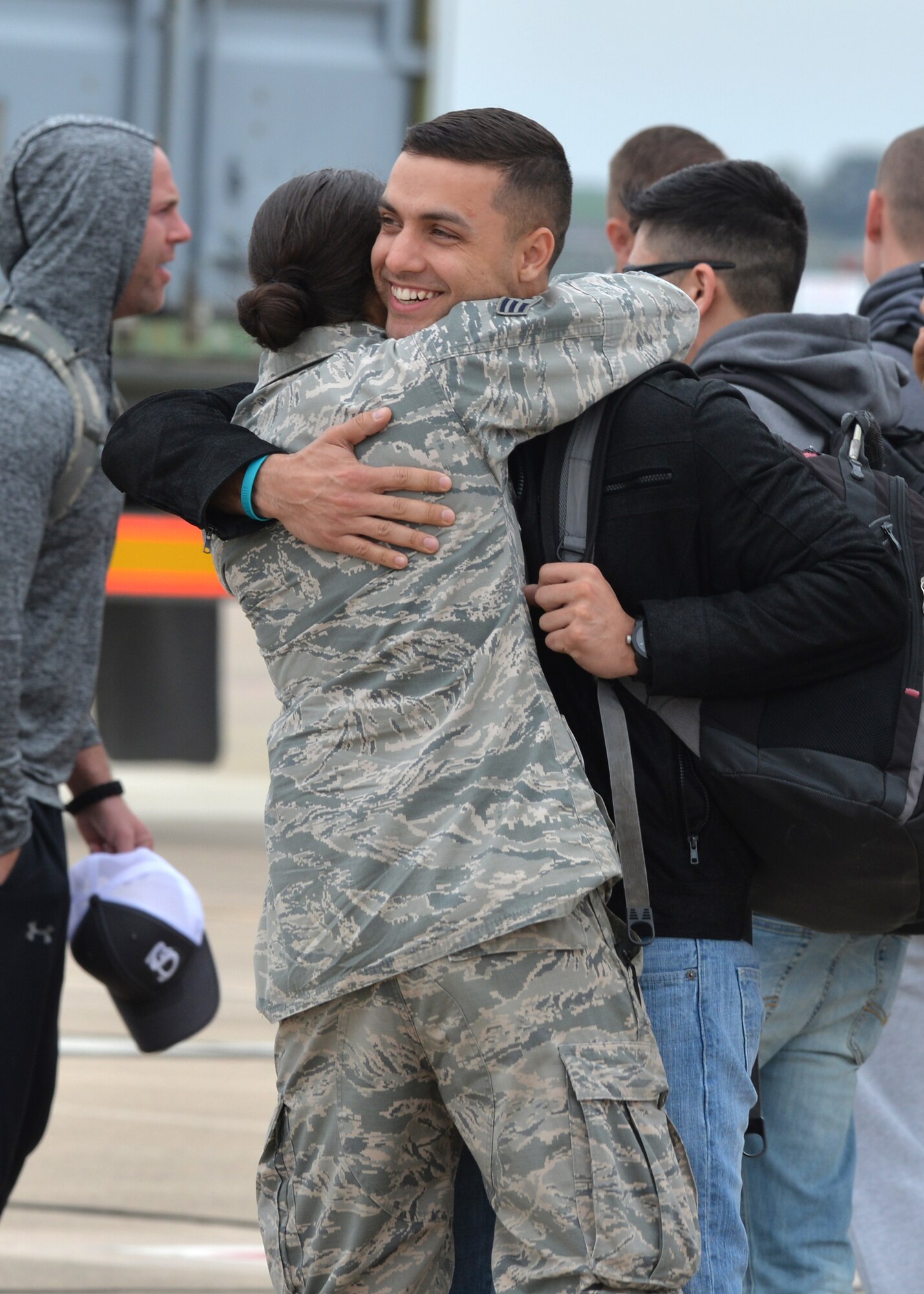 Main-body personnel from Barksdale Air Force Base, La., receive a warm welcome from advance-party Airmen upon their arrival at Morón Air Base, Spain, Feb. 26, 2016. These Airmen will be assigned to the 2nd Expeditionary Bomb Group for the duration of Cold Response 16, a large-scale NATO military training exercise. Approximately 16,000 troops from a dozen allied nations are scheduled to participate in the biennial exercise.