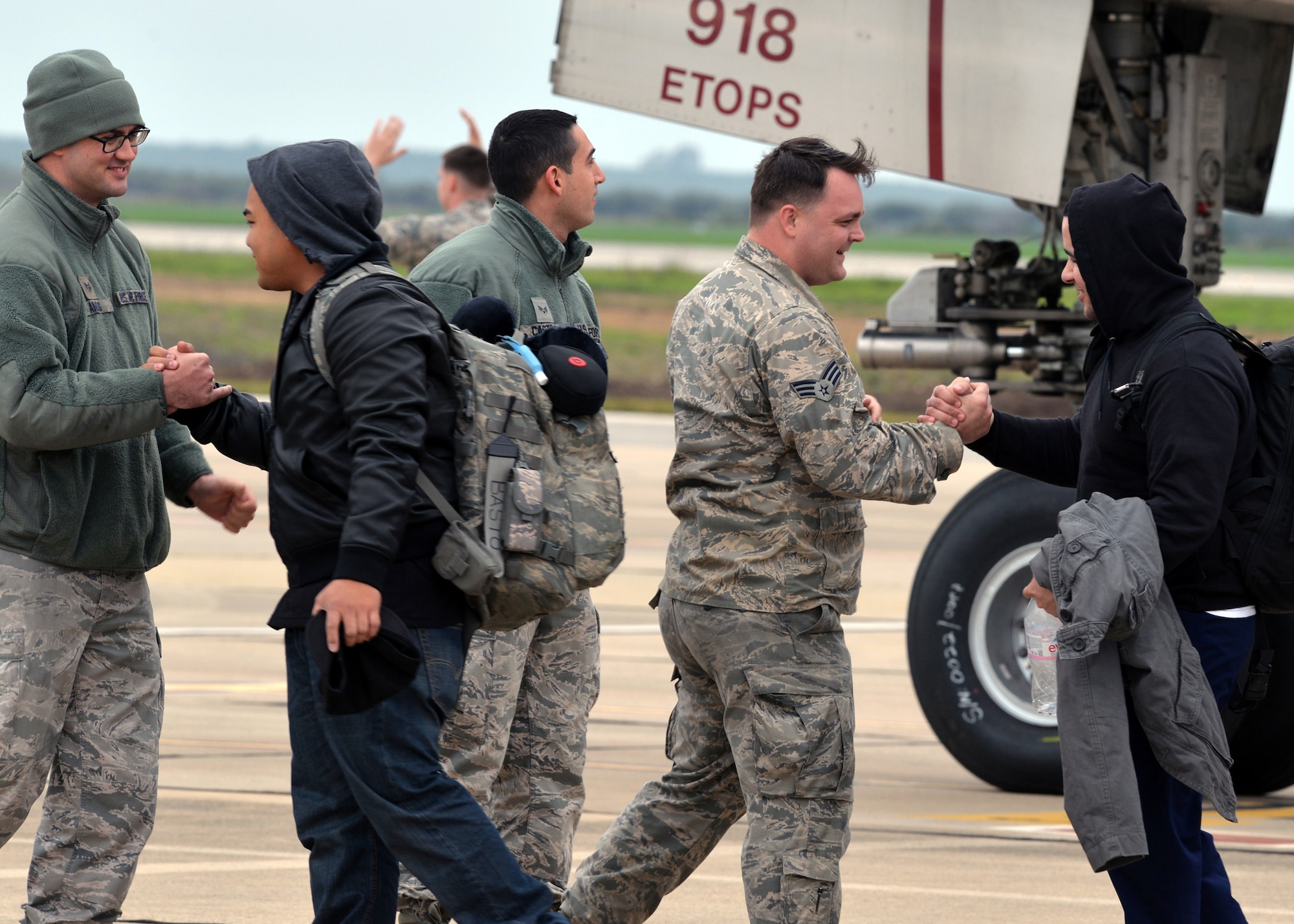 Advance-party personnel greet main-body Airmen from Barksdale Air Force Base, La., upon their arrival at Morón Air Base, Spain, Feb. 26, 2016. These Airmen will all be assigned to the 2nd Expeditionary Bomb Group during Cold Response 16, a large-scale NATO military training exercise. This year’s iteration of the biennial exercise includes maritime, ground and air operations in the Trøndelag region of Norway.