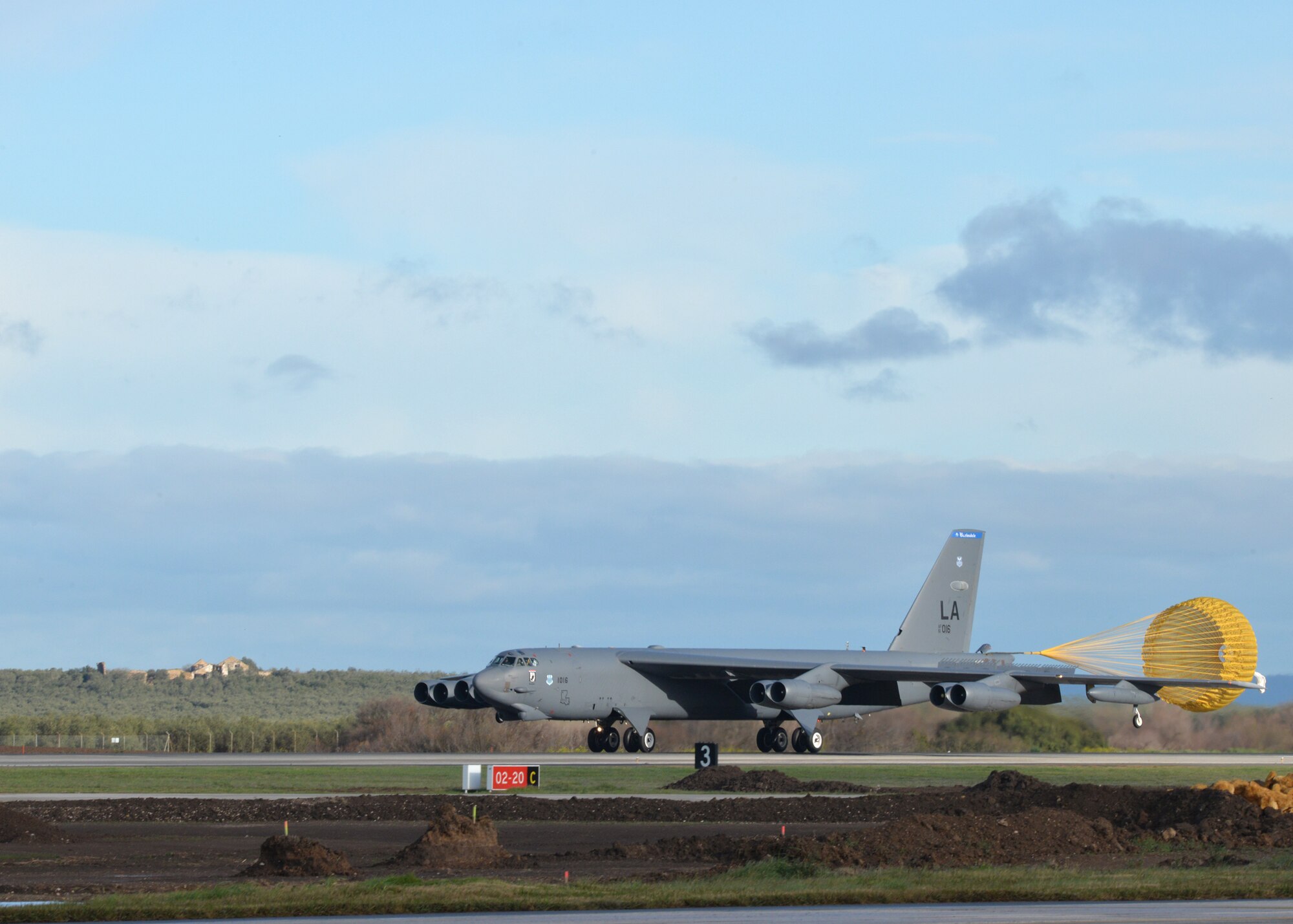 A B-52 Stratofortress arriving at Morón Air Base, Spain, deploys a drogue parachute to slow itself after landing, Feb. 27, 2016. Three B-52s from Barksdale Air Force Base, La., will be temporarily reassigned to the 2nd Expeditionary Bomb Group for the duration of a large-scale NATO military exercise in which they will participate. The Norwegian-led Cold Response 16 will involve approximately 16,000 troops from a dozen allied and partner nations and last nearly two weeks. (U.S. Air Force photo/Senior Airman Joseph Raatz)
