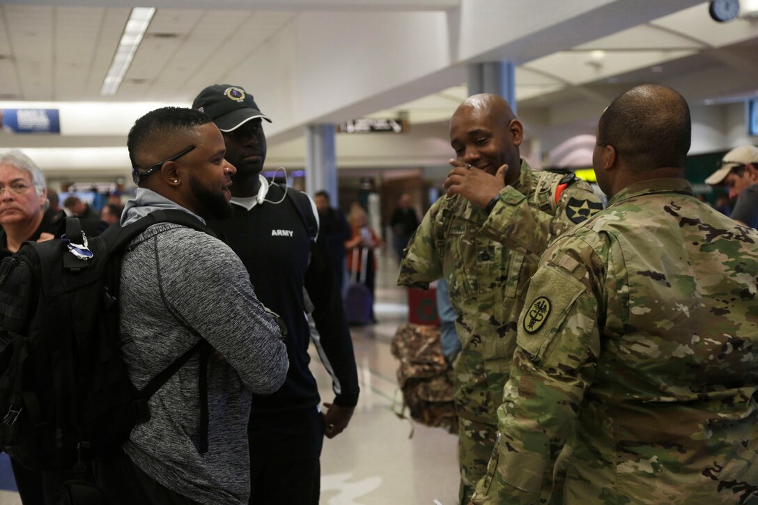 Army active duty and veterans receive information from Army Maj. Rodney Lamberson at the El Paso International Airport, El Paso, Texas, Feb. 26, 2016. More than 100 wounded, ill and injured soldiers and veterans are on Fort Bliss to train and compete in a series of athletic events including archery, cycling, shooting, sitting volleyball, swimming, track, and field, and wheelchair basketball. Army Trails, March 6-10, are conducted by the Department of Defense Warrior Games 2016 Army Team, Approximately 250 athletes, representing teams from the Army, Marine Corps, Navy, Air Force, Special Operations Command and the British Armed Forces will compete in the DoD Warrior Games June 14-22 at the U.S. Military Academy, West Point, N.Y. U.S. Army photo by Spc. Adasia Ortiz
