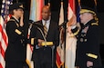 Army Chief of Staff Gen. Mark A. Milley formally swears in Lt. Gen. Nadja Y. West as 44th Army surgeon general as her husband, Don, holds the Bible on Joint Base Myer-Henderson Hall, Va., Feb. 9, 2016.