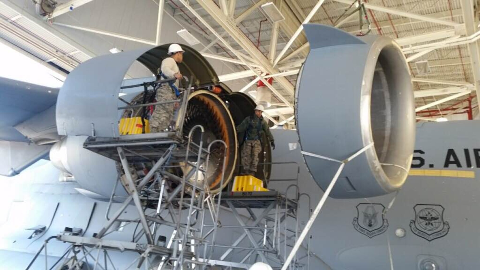 Reservists from the 712th Aircraft Maintenance Squadron repair a Team Dover C-17 Globemaster III at Charleston AFB, South Carolina, after it encountered an engine bird strike near Ft. Campbell, Kentucky, February 27, 2016. Dover reservists were at Charleston AFB as part of their annual training requirements away from home station. (U.S. Air Force photo courtesy Senior Master Sgt. Corey Diluzio)