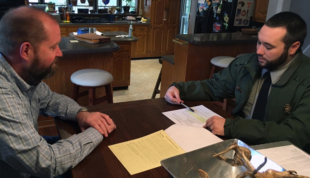 Natural resource specialist, Dylon Anderson meets with an adjacent landowner on March 16, 2016 to discuss his minor shoreline license on Old Hickory Lake. 