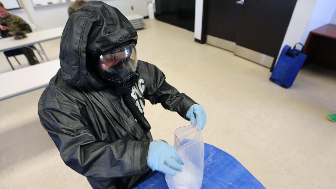 Lance Cpl. Nikolas Raven tests simulated biohazards during a mock training drill at Marine Corps Air Station Cherry Point, N.C., Feb. 19, 2016. Marines with with Marine Wing Headquarters Squadron 2, Marine Aircraft Group 14 and Marine Aircraft Group 28 took part in a three-day long training exercise where Marines honed their skills with their equipment and knowledge of protocol. Marines conducted live radiological training at Marine Corps Outlying Field Atlantic as part of additional training to prepare them for any potential situation that may arise in the future and concluded the exercice with a debrief at MCAS Cherry Point. Raven is a chemical, biological, radiological nuclear defense specialist with MWHS-2.