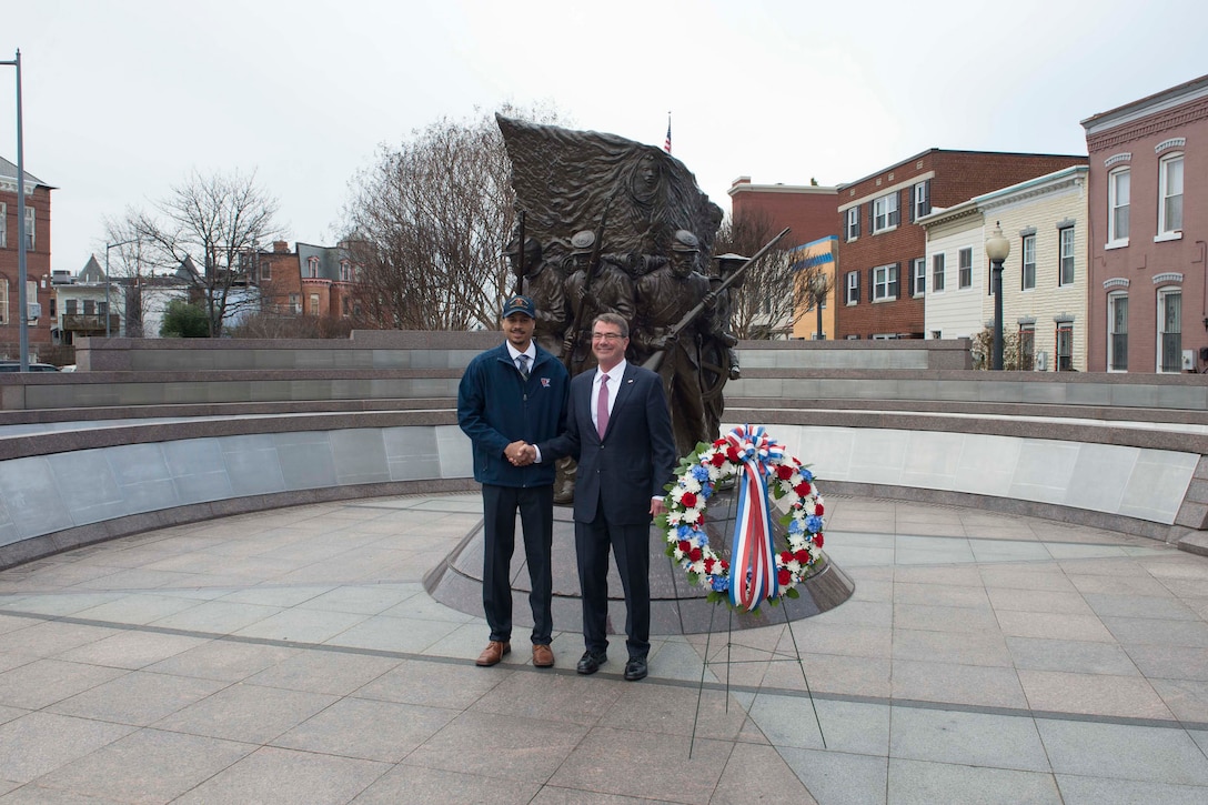 Defense Secretary Ash Carter poses for a photo with the manager of the African American Civil War Memorial and Museum in Washington, D.C., Feb. 29, 2016. DoD photo by Navy Petty Officer 1st Class Tim D. Godbee
