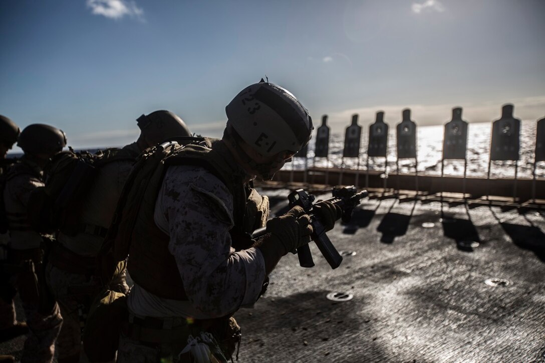 U.S. Marines with the 13th Marine Expeditionary Unit conduct live fire drills while at sea aboard the USS New Orleans, Feb. 26, 2016. Marines continue training to hone their skills as more than 4,500 Marines and Sailors from the 13th MEU and Boxer Amphibious Ready Group transit across the Pacific Ocean en route to the Pacific and Central Commands areas of responsibility. (U.S. Marine Corps photo by Sgt. Tyler C. Gregory/Released)