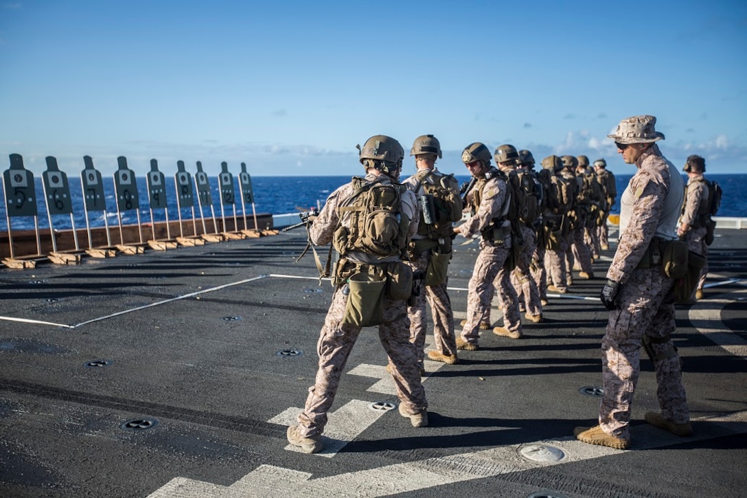 U.S. Marines with the 13th Marine Expeditionary Unit conduct live fire drills while aboard the USS New Orleans, Feb. 26, 2016. Marines continue training to hone their skills as more than 4,500 Marines and Sailors from the 13th MEU and Boxer Amphibious Ready Group transit across the Pacific Ocean en route to the Pacific and Central Commands areas of responsibility. (U.S. Marine Corps photo by Sgt. Tyler C. Gregory/Released)