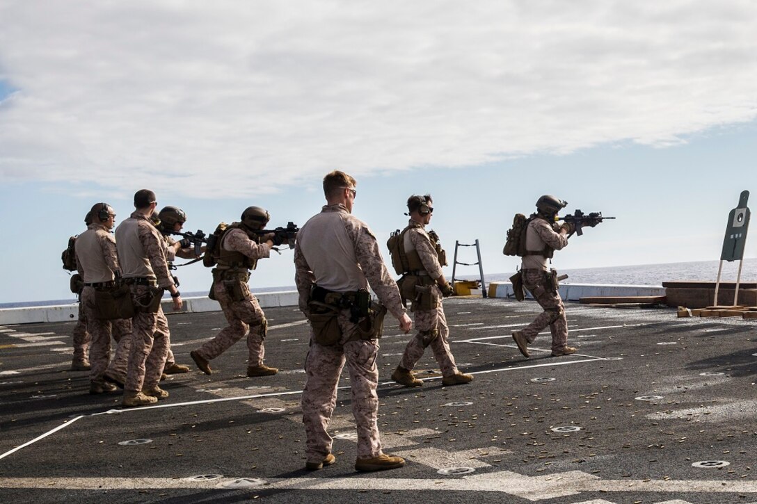 U.S. Marines and Sailors with the 13th Marine Expeditionary Unit conduct a live-fire range aboard the USS New Orleans, Pacific Ocean, Feb. 26, 2016. In order to keep their skills sharp, ranges like these are conducted on a weekly basis. More than 4,500 Sailors and Marines from the Boxer Amphibious Ready Group, 13th Marine Expeditionary Unit team are currently transiting the Pacific Ocean toward the U.S. 7th Fleet area of operations during a scheduled deployment. (U.S. Marine Corps photo by Lance Cpl. Alvin Pujols/RELEASED)