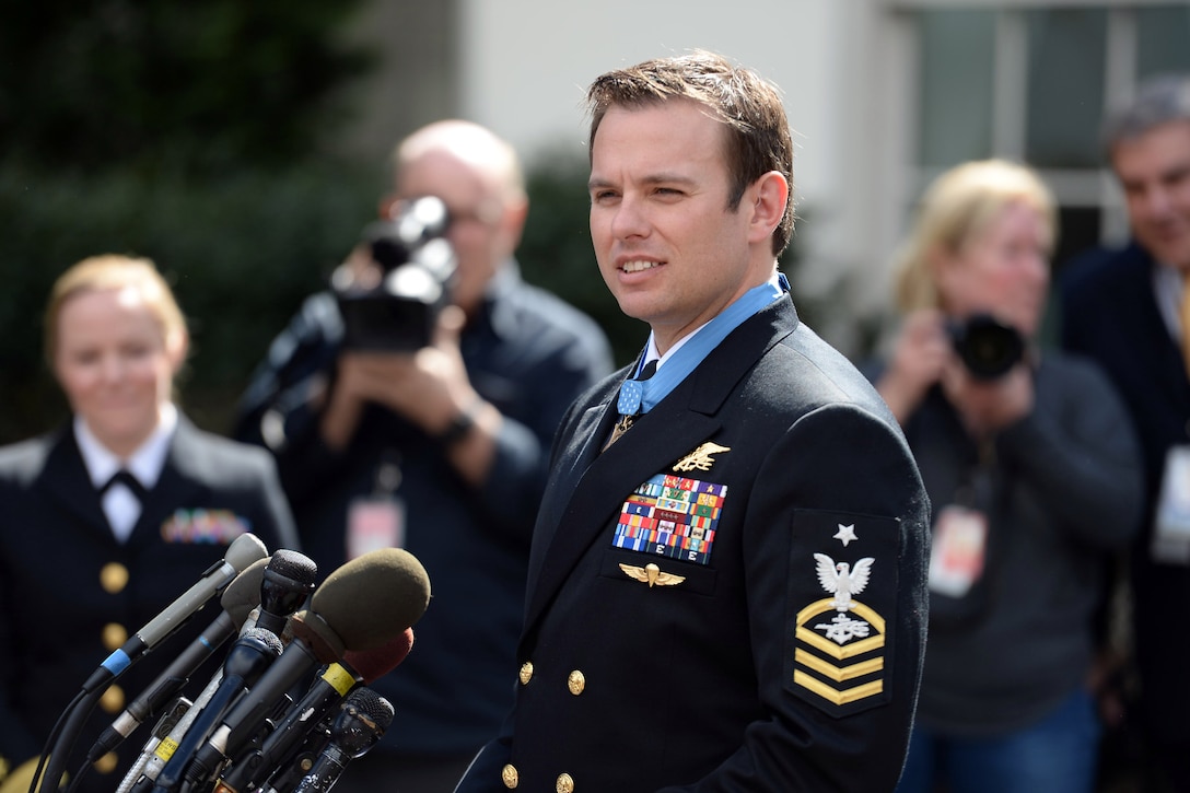 Navy Senior Chief Petty Officer Edward C. Byers Jr. gives remarks outside the West Wing after a ceremony honoring him with the Medal of Honor at the White House in Washington, D.C., Feb. 29, 2016. DoD  photo by EJ Hersom