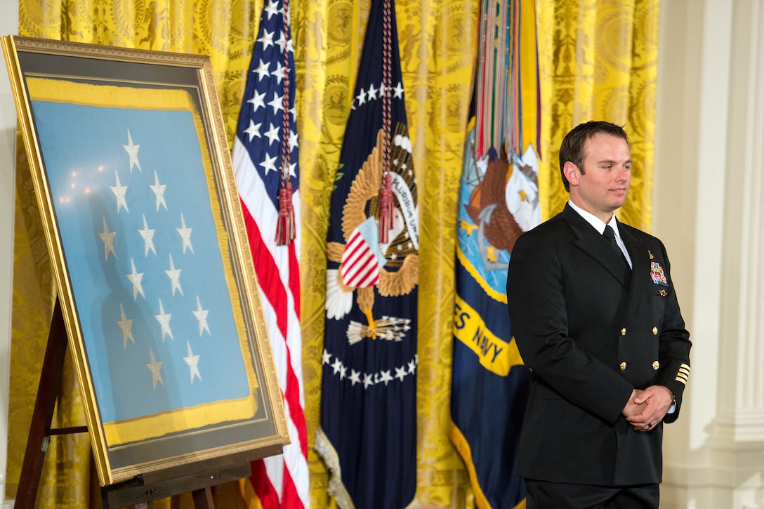 Navy Senior Chief Petty Officer Edward C. Byers Jr. listens to remarks during a ceremony in which President Barack Obama presented him with the Medal of Honor at the White House in Washington, D.C., Feb. 29, 2016. DoD photo by EJ Hersom