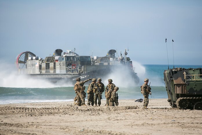 A Landing Craft Air Cushion from Assault Craft Unit Five, lands ashore to drop equipment and personnel in support of the Amphibious Landing Exercise (PHIBLEX) for Exercise Iron Fist 2016 aboard Camp Pendleton, Calif., Feb. 26, 2016. This year’s PHIBLEX was a bilateral, ship-to-shore, amphibious assault, between the U.S. Marine Corps and Japan Ground Self-Defense Force, utilizing AAVs to seize objectives via beachhead. 