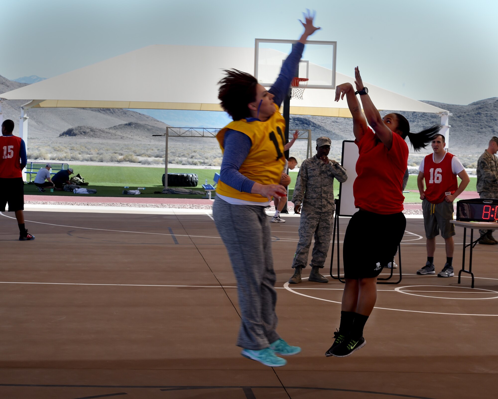 Airmen compete in a three-on-three basketball tournament Feb. 26, 2016, at Creech Air Force Base, Nevada. This tournament is an annual event which challenges Airmen in friendly competition to build camaraderie. (U.S. Air Force photo by Senior Airman Adarius Petty/Released)