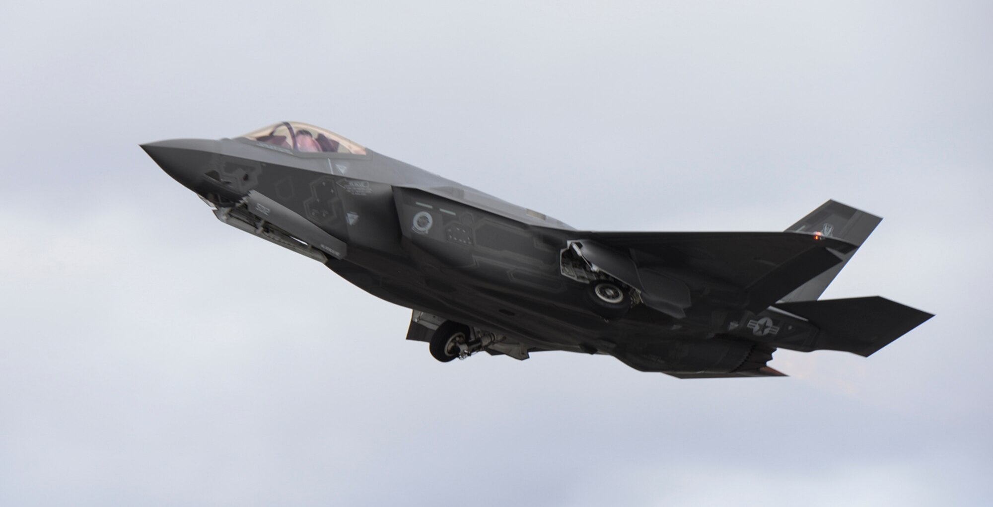 An F-35A soars above the runway at Mountain Home Air Force Base, Idaho, Feb. 18, 2016. While here, the F-35s are scheduled to fly approximately four sorties a day with their 4th generation counterparts, dropping 20-30 inert weapons during multiple training scenarios throughout the test. (U.S. Air Force photo by Airman 1st Class Jessica H. Evans/RELEASED)