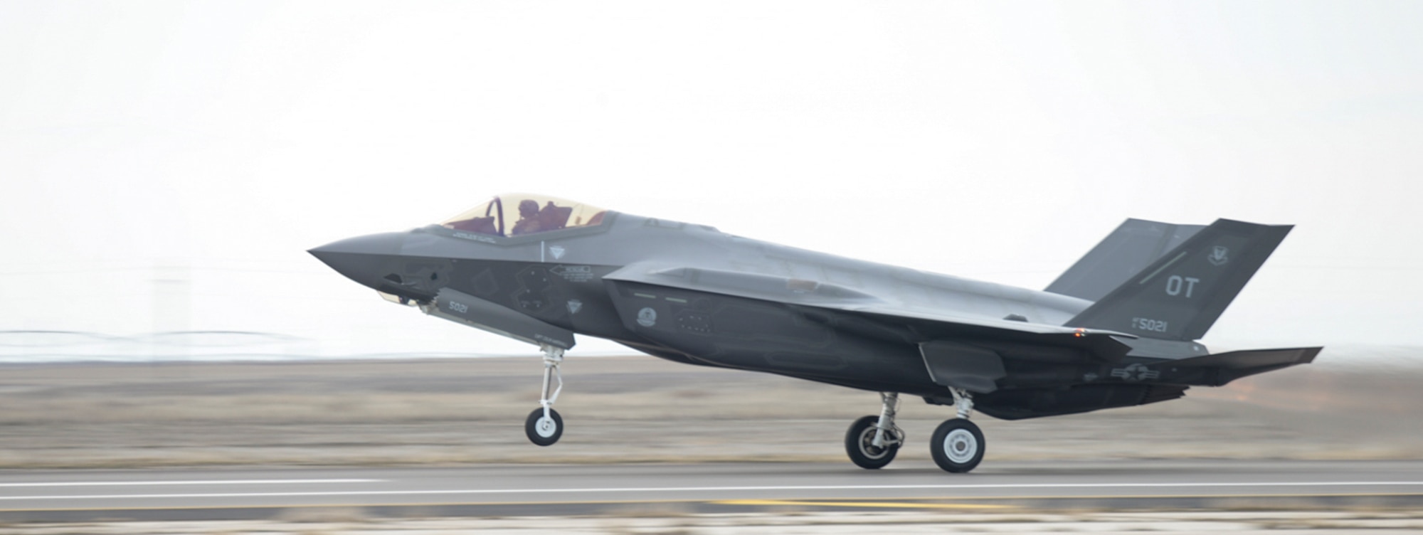 An F-35A ascends into take-off at Mountain Home Air Force Base, Idaho, Feb. 12, 2016. The aircraft is here to execute key mission capabilities as part of a deployment test. (U.S. Air Force photo by Airman 1st Class Jessica H. Evans/RELEASED)