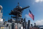 160226-N-RM689-212
SOUTH CHINA SEA (Feb. 26, 2016)- Sailors aboard amphibious dock landing ship raise the ensign while navigating the waters of the South China Sea. Ashland is assigned to the Bonhomme Richard Amphibious Ready Group (BHRARG) and is conducting a routine patrol in the 7th Fleet area of responsibility. (U.S. Navy photo by Mass Communication Specialist Seaman Kelsey L. Adams/Released)

