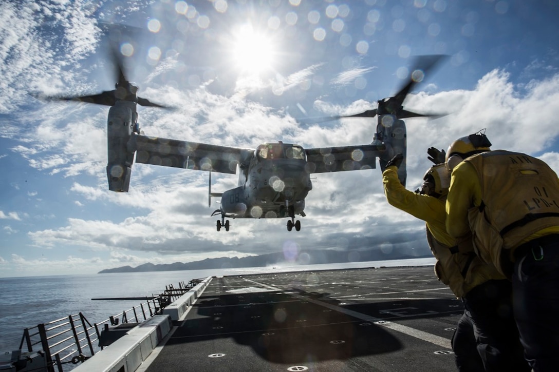 U.S. Navy Sailors with the Boxer Amphibious Ready Group signal the pilots of a U.S. Marine MV-22 Osprey during take off procedures aboard the USS New Orleans, at sea, Feb. 20, 2016. Aircraft handlers, along with the flight line section ensure that aircraft land and take off safely. More than 4,500 Sailors and Marines from the Boxer Amphibious Ready Group, 13th Marine Expeditionary Unit team are currently transiting the Pacific Ocean toward the U.S. 7th Fleet area of operations during a scheduled deployment.