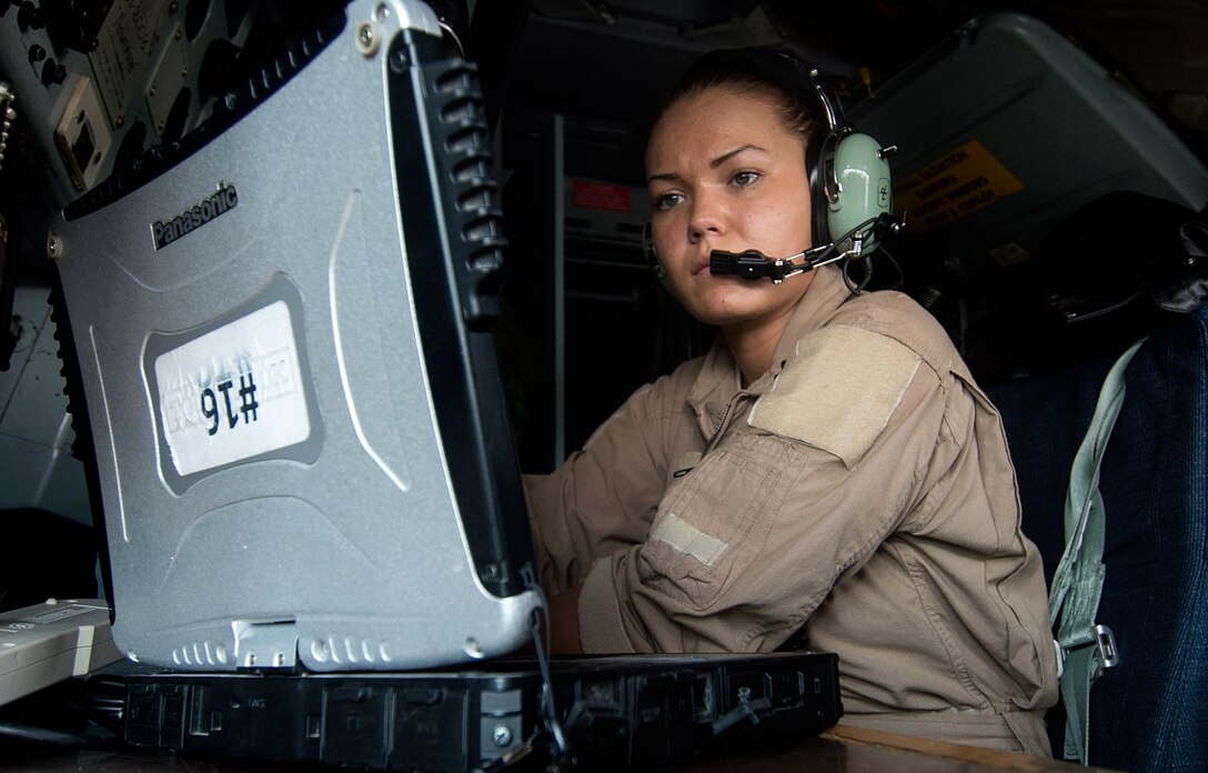 Airman 1st Class Shelby Bowling, 340th Expeditionary Air Refueling Squadron boom operator, performs pre-flight checklists at Al Udeid Air Base, Qatar, in support of Operation Inherent Resolve, Dec. 31, 2015. Bowling is currently a boom operator assigned to the 350th ARS and has deployed multiple times to support contingencies around the world. (U.S. Air Force photo by Tech. Sgt. Nathan Lipscomb)