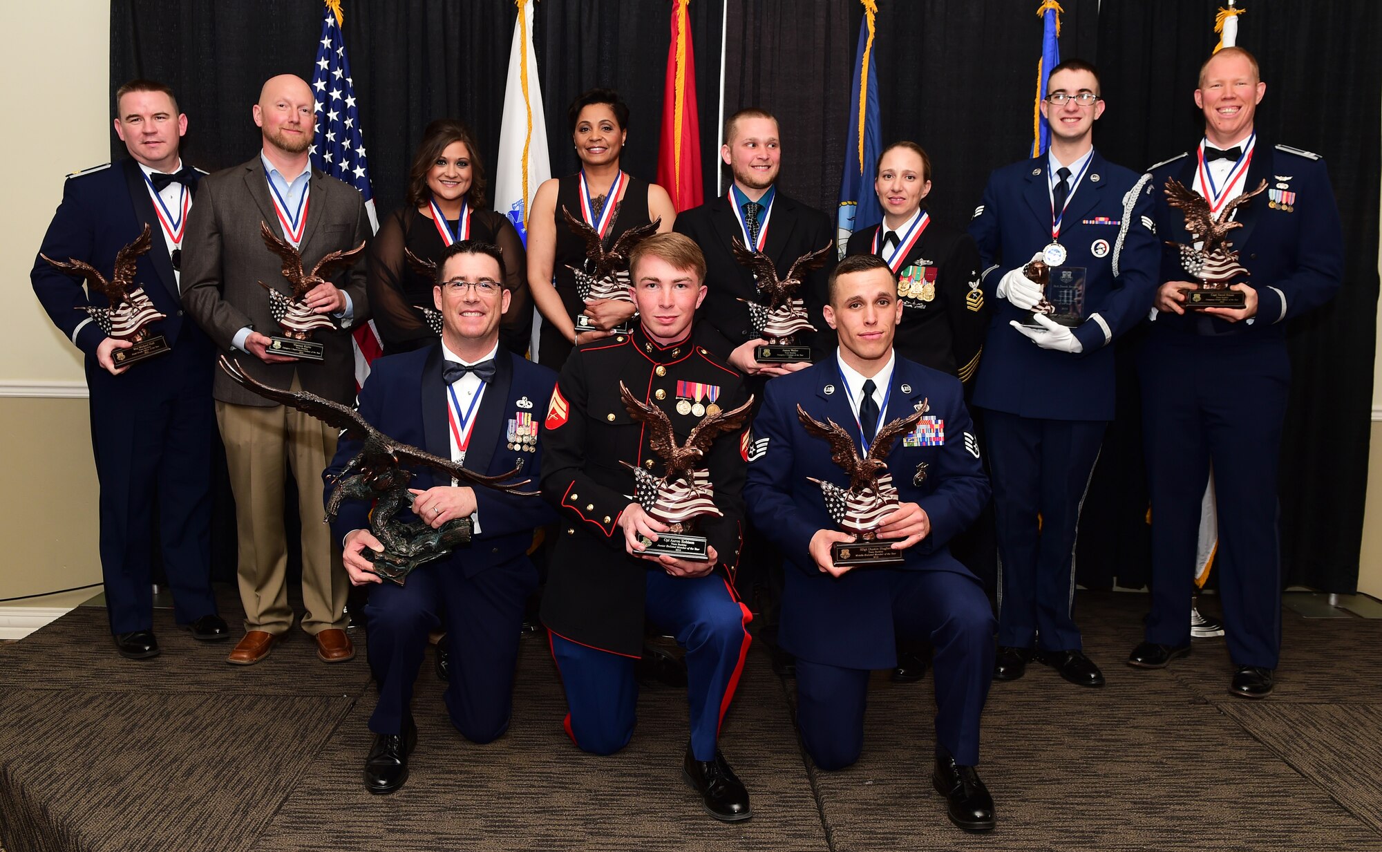 Team Buckley 2015 Annual Award winners pose following a ceremony Feb. 26, 2016, at The Summit in Aurora, Colo. The annual awards included 10 individual awards and one team excellence award and represent the top performers on Buckley Air Force Base, Colo. (U.S. Air Force photo by Senior Airman Racheal E. Watson/Released)