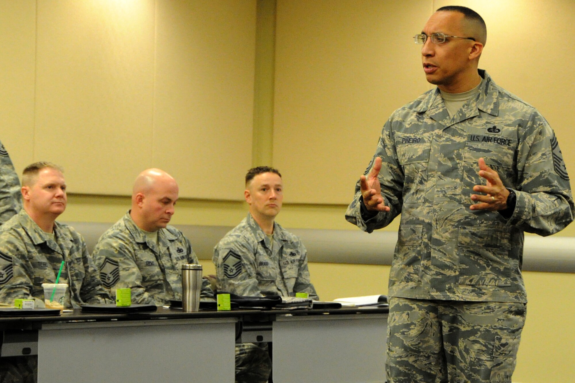 Air Force District of Washington First Sergeant Chief Master Sgt. Manny Pineiro speaks to the newest chief master sergeants from the National Capital Region during the AFDW’s Chief Orientation Course at Joint Base Andrews, Md., Feb. 29, 2016. Key Air Force leaders addressed the group reminding them of the increased responsibility they now have for their Airmen and the force. (U.S. Air Force photo/Tech. Sgt. Matt Davis)