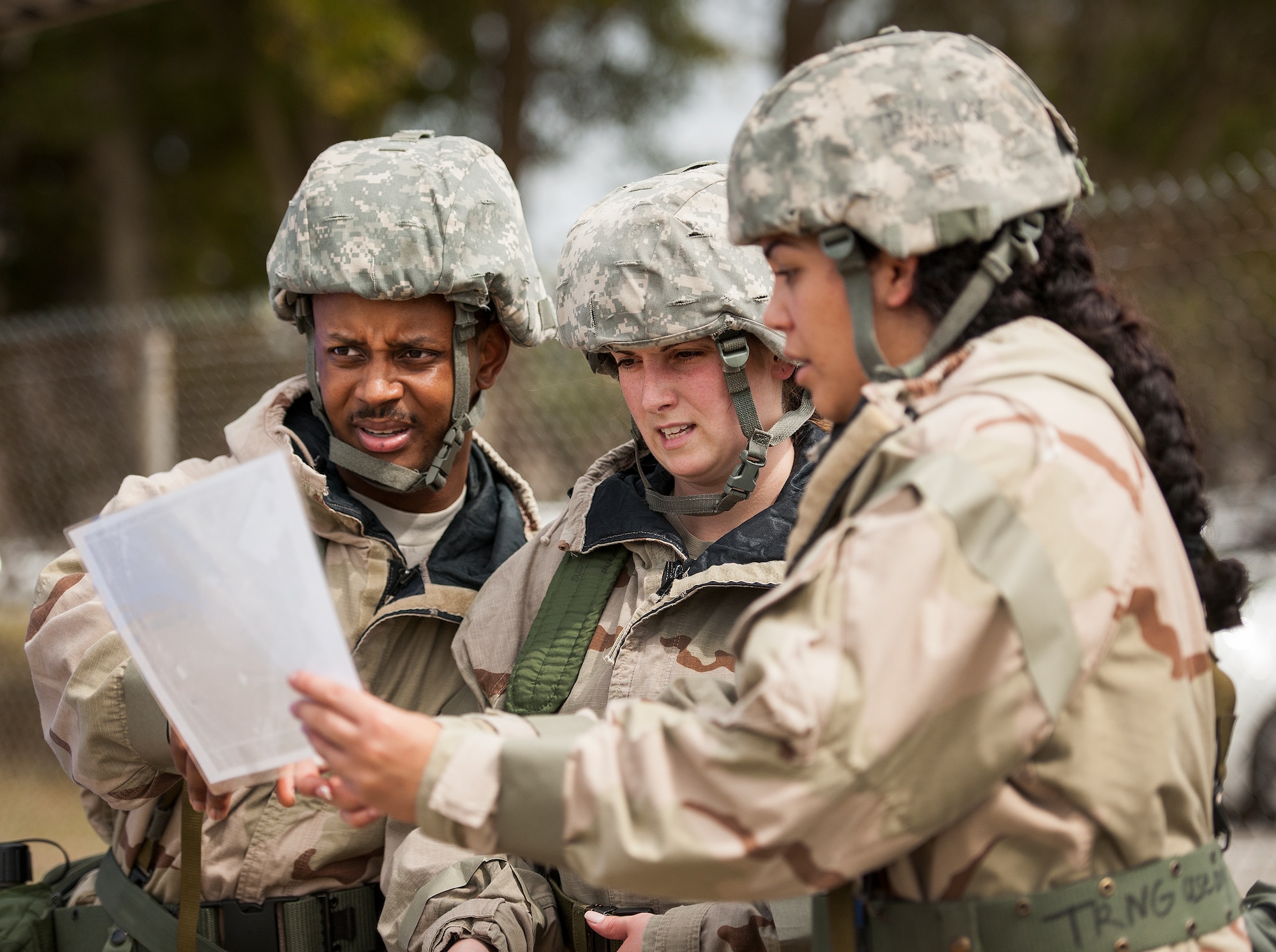 Airmen determine map coordinates during a chemical, biological, radiological, nuclear and explosive exercise at Eglin Air Force Base, Fla., Feb. 23.  The exercise evaluated the Airmen’s ability to meet wartime and contingency taskings of employing and sustaining the force and the ability to survive and operate.  (U.S. Air Force photo/Samuel King Jr.)