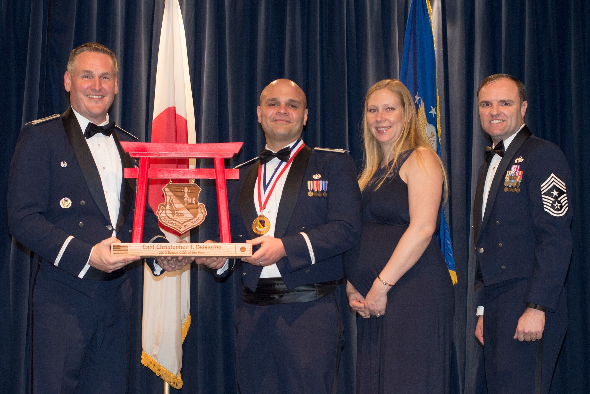 Capt. Christopher DelGiorno, 5th Air Force, receives the 2015 Kensei CGO of the Year Award at Yokota Air Base, Japan, Feb. 19, 2016. (U.S. Air Force photo by Senior Airman David Danford/Released)