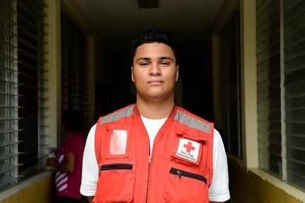 Roy Broonfield, Red Cross volunteer, poses for a photo during a Medical Readiness Training Exercise in the Cortes Department, Honduras, Feb. 19, 2016. Broonfield helped the pharmacy fill over 1,000 prescriptions during a two day MEDRETE on the coastal town North of San Pedro Sula, by translating prescriptions for locals. (U.S. Air Force photo by Staff Sgt. Westin Warburton/Released)