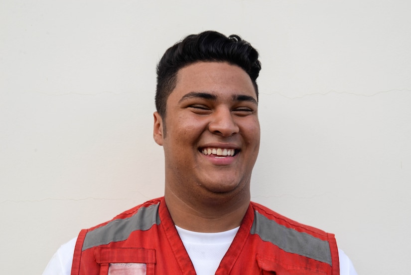 Roy Broonfield, Red Cross volunteer, smiles for a photo during a Medical Readiness Training Exercise in the Cortes Department, Honduras, Feb. 19, 2016. Broonfield helped translate for over 500 people during the MEDRETE, which helps locals receive basic medical attention and provides Servicemembers an opportunity to conduct their jobs in austere locations. (U.S. Air Force photo by Staff Sgt. Westin Warburton/Released)