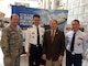 From left, Brig. Gen. David Fountain, Assistant Adjutant General for Air, Maj. Gen. Jefferson Burton, Utah National Guard Adjutant General, Governor Gary R. Herbert, Commander in Chief of the Utah National Guard, and Tech Sgt. Johnson Xaysana, an Air National Guard recruiter, enjoy a photo opportunity during the Utah Defense Alliance Meet the Military luncheon held Feb. 5. The event, held in the Utah State Capitol Bulding Rotunda, provided an opportunity for interaction and dialogue between legislators, military members and civic leaders. (U.S. Air National Guard photo by Senior Master Sgt. Brian Garrett/Released)