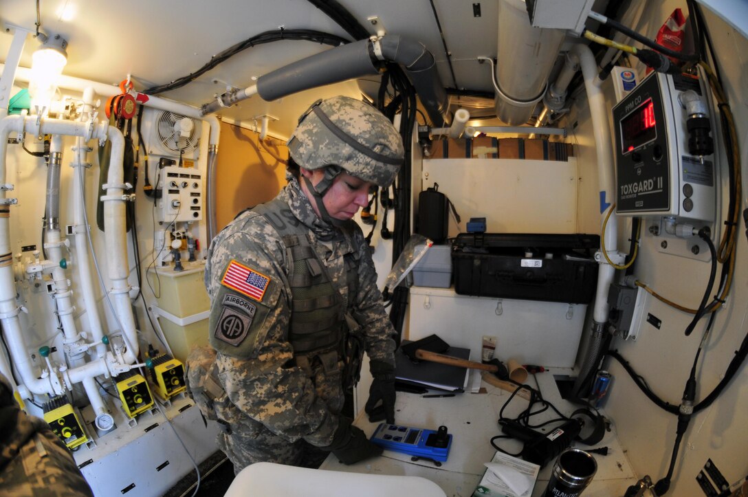 Sgt. Shannon Shields, from Franklin, Pa., a water treatment specialist with the 326th Quartermaster Company (Water Storage and Distribution), performs a turbidity test on the water cleaned for Soldiers use during Warrior Exercise 78-15-01 at Fort A.P. Hill, Va., Jan. 12, 2015. Approximately 4000 active duty, National Guard, Army Reserve and U.S. Navy personnel are participating in WAREX 78-15-01 at multiple locations in the eastern US. (Army Photo by Sgt. Christopher Bigelow / 316th ESC)