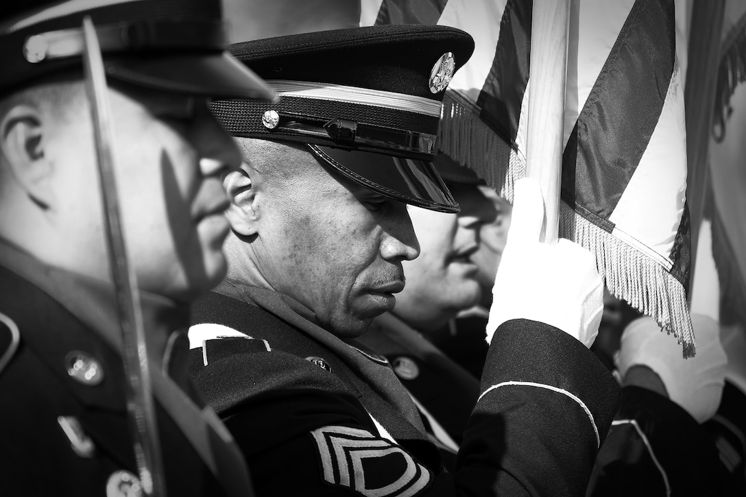 Sgt. 1st Class William Keys, 85th Support Command, holds an American flag during a flag presentation rehearsal at Grant Park in downtown Chicago, April 29. The soldiers were there to present the flag during the national anthem at the National Football League (NFL) Prospect Draft Clinic opening ceremony, Apr. 29.
(U.S. Army photo by Mr. Anthony L. Taylor/Released)