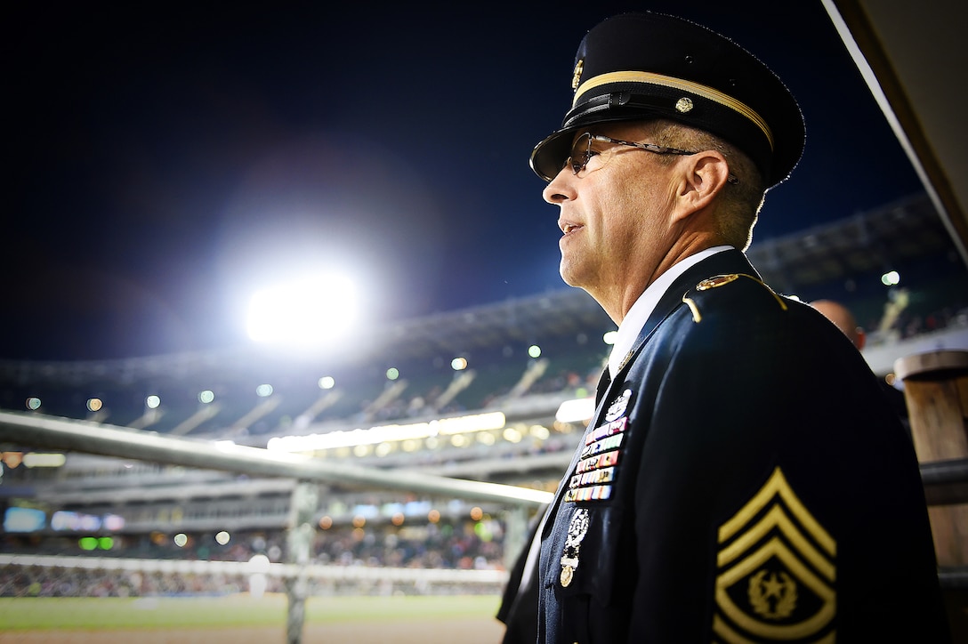 Army Reserve Command Sgt. Maj. Kevin J. Greene, command sergeant major, 85th Support Command, prepares to walk out onto the field during the Chicago White Sox “National Day of Remembrance Take the Field’ ceremony, Sept. 11. Greene was there with service members and first responders at U.S. Cellular to take part in a recognition during the White Sox home game vs the Minnesota Twins. (U.S. Army photo by Sgt. 1st Class Anthony L. Taylor/Released)