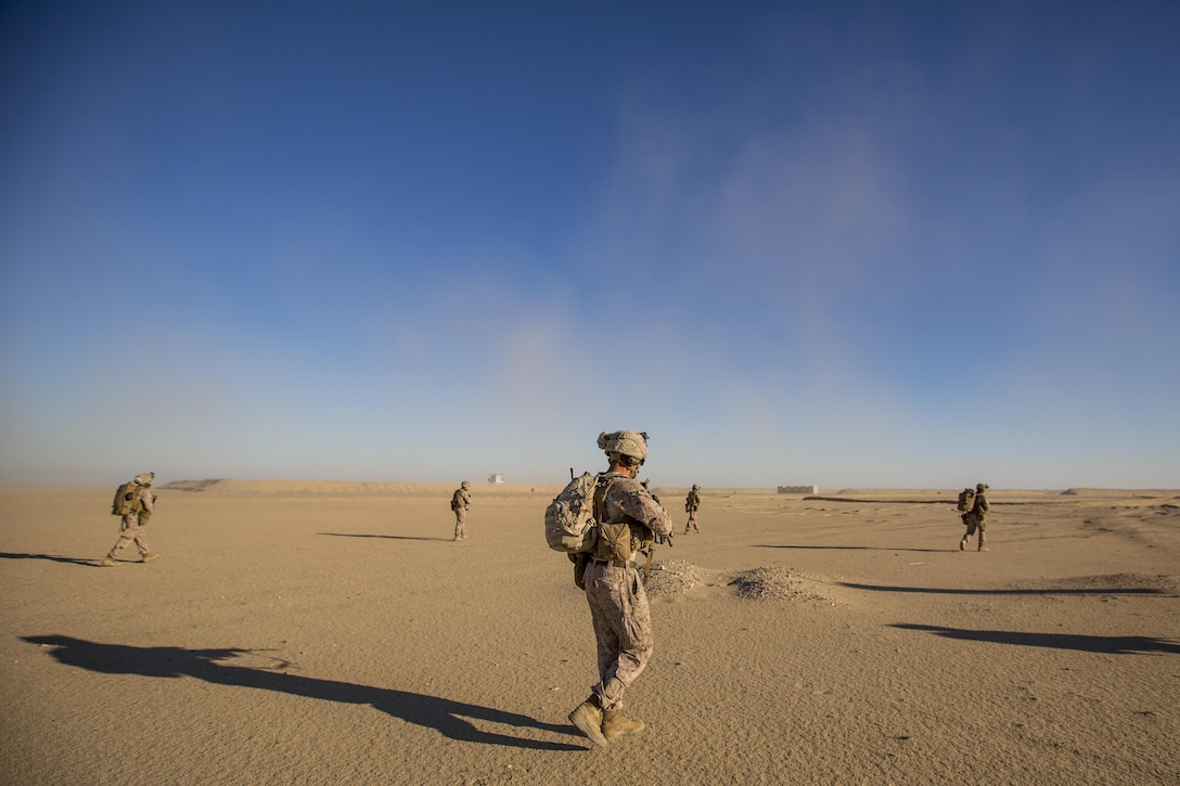 U.S. Marines patrol during a tactical exercise to recover aircraft and personnel at an undisclosed location in Southwest Asia, Dec. 28, 2015. The Marines are assigned to 1st Battalion, 7th Marine Regiment, Special Purpose Marine Air-Ground Task Force-Crisis Response-Central Command. U.S. Marine Corps photo by Lance Cpl. Clarence Leake